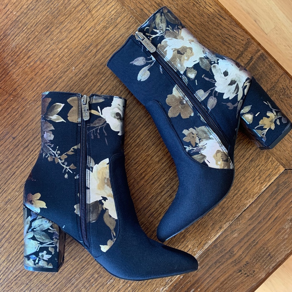 Black floral heeled boots